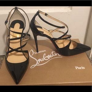 Size 7 US (37 UK) Louboutin black high heels.